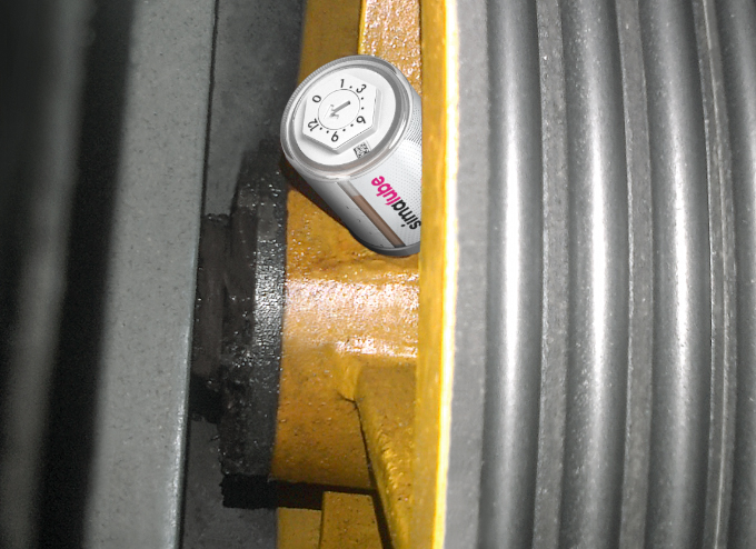 El lubricador simalube lubrica de forma automática y continua la polea de retorno en los ascensores. El dispensador puede montarse directamente en el punto de lubricación.