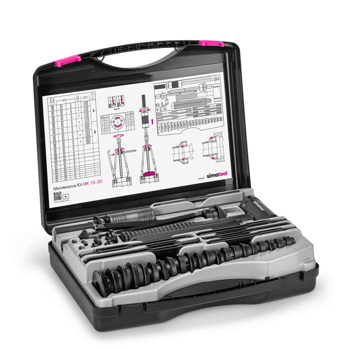 Kit de maintenance de roulements simatool MK 10-30 Mallette ouverte. À l'intérieur de la mallette se trouve un guide d'utilisation comprenant un tableau de sélection des roulements. 