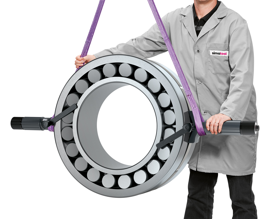 El simatool BHT 500-700 encierra el anillo exterior del rodamiento de rodillos esféricos con una banda de acero.  El orificio permanece libre, por lo que el rodamiento puede introducirse simplemente en un eje. 
