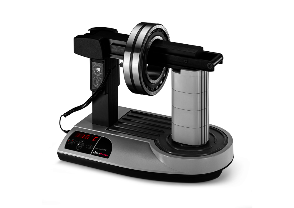 The simatherm IH 210 induction heater heats a deep groove ball bearing over the sliding yoke. The target temperature is set to 110 °C. 